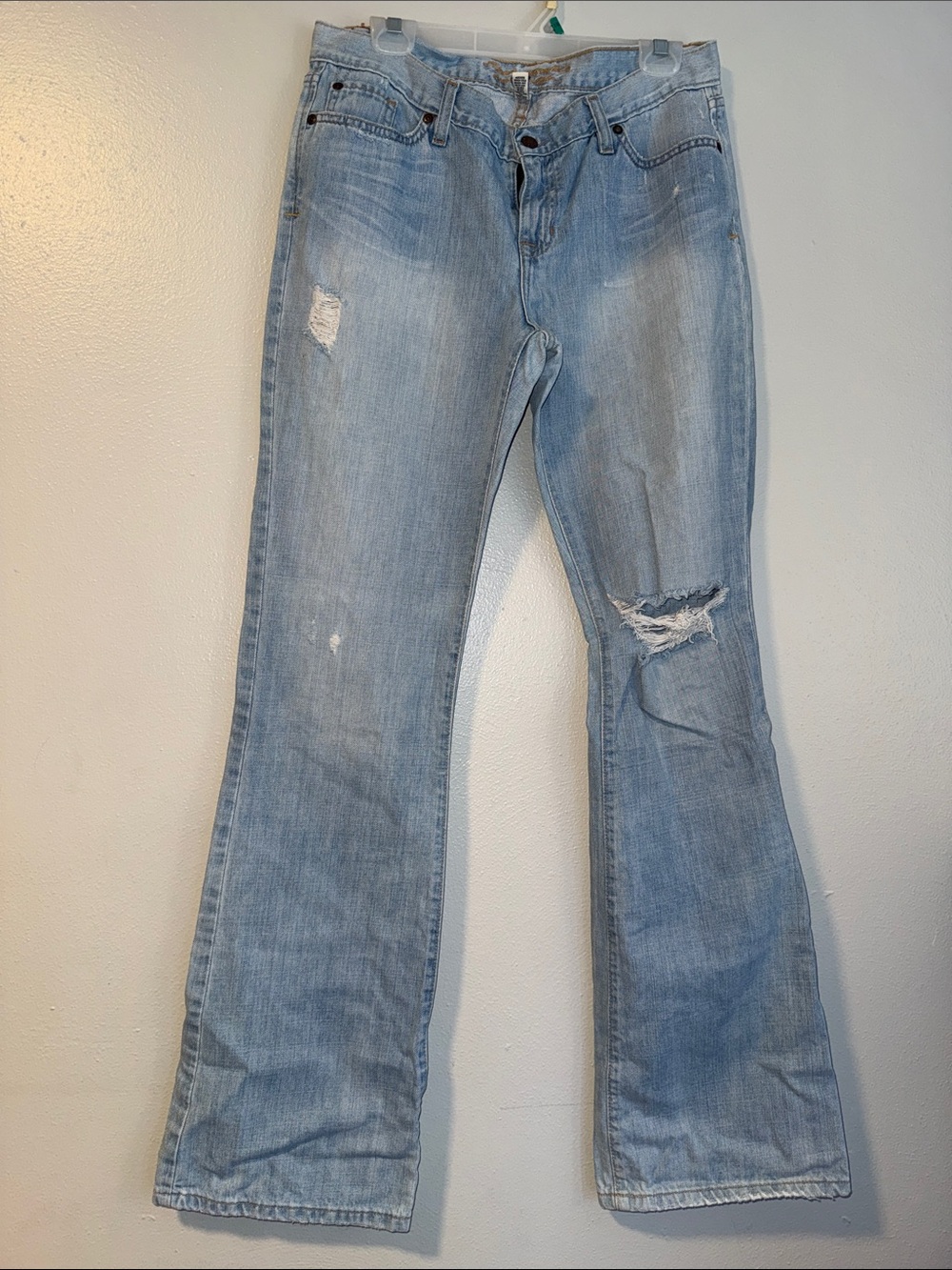Light Wash Abercrombie and Fitch 
Women’s Jeans - long flare distressed jeans